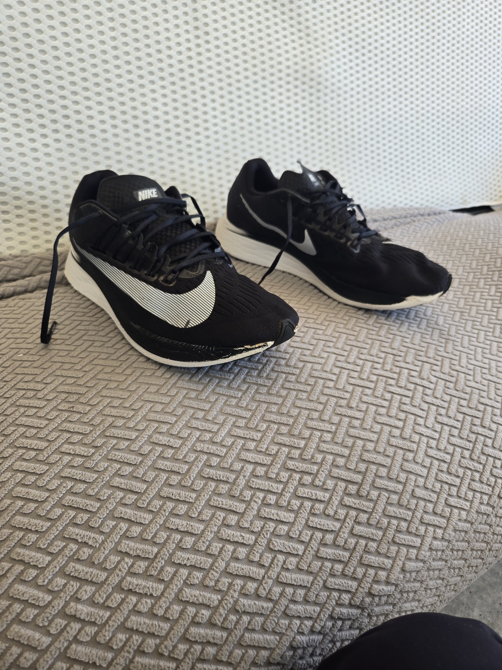 Nike Men’s Black Running Shoes with White Swoosh